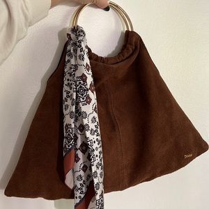 Brand new Brown faux suede Italian “Dixie” purse with gold ring handles